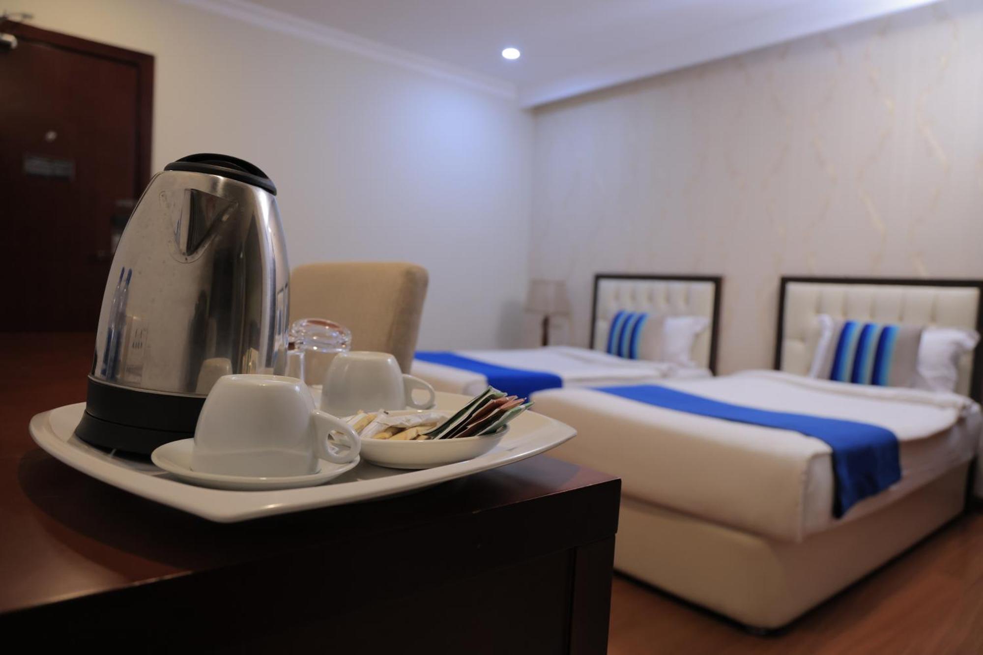 Tolip Olympia Hotel Addis Abeba Zimmer foto